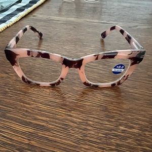 Black and pink woman’s fashion glasses